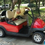 Don cleans the Tiffin golf cart