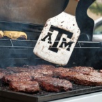 Grilling Texas burgers at Tiffin House