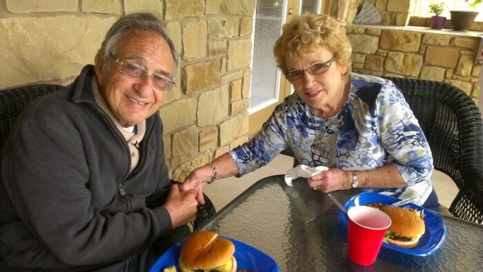 Joe and Inez enjoy their grilled burgers at the Tiffin House Memorial Day Picnic