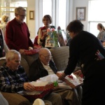Tiffin House residents exchange Christmas presents